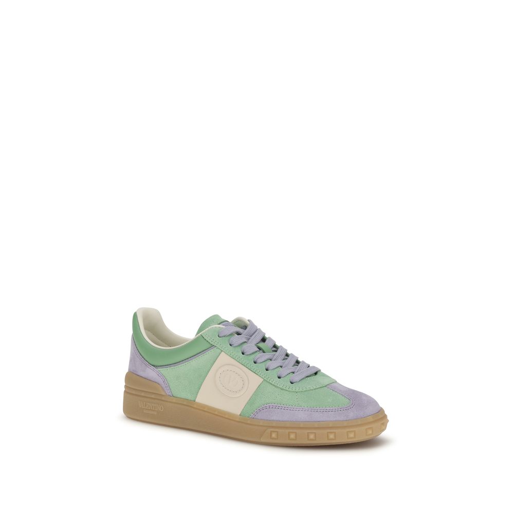 Experience the allure of Valentino Garavani's Multicolor Calf Leather Bos Taurus Low Top Sneakers, where exquisite craftsmanship meets contemporary elegance for the discerning individual.
