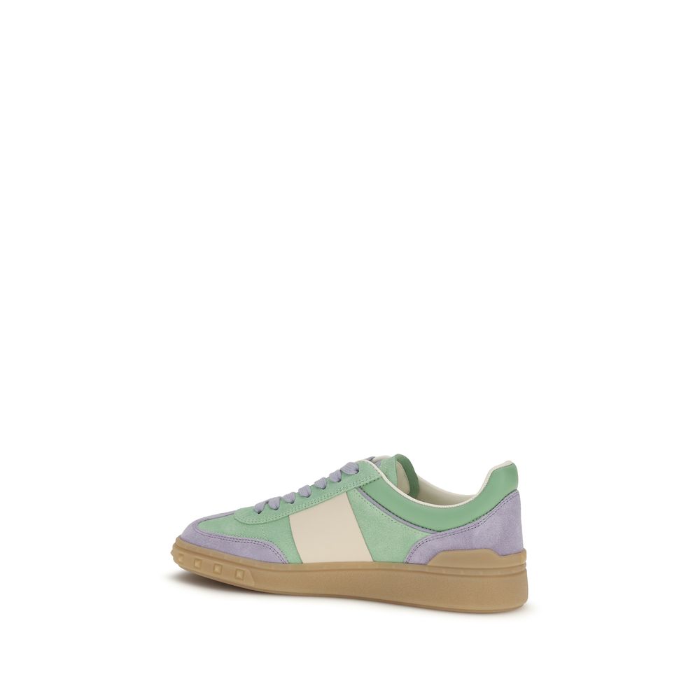 Experience the allure of Valentino Garavani's Multicolor Calf Leather Bos Taurus Low Top Sneakers, where exquisite craftsmanship meets contemporary elegance for the discerning individual.