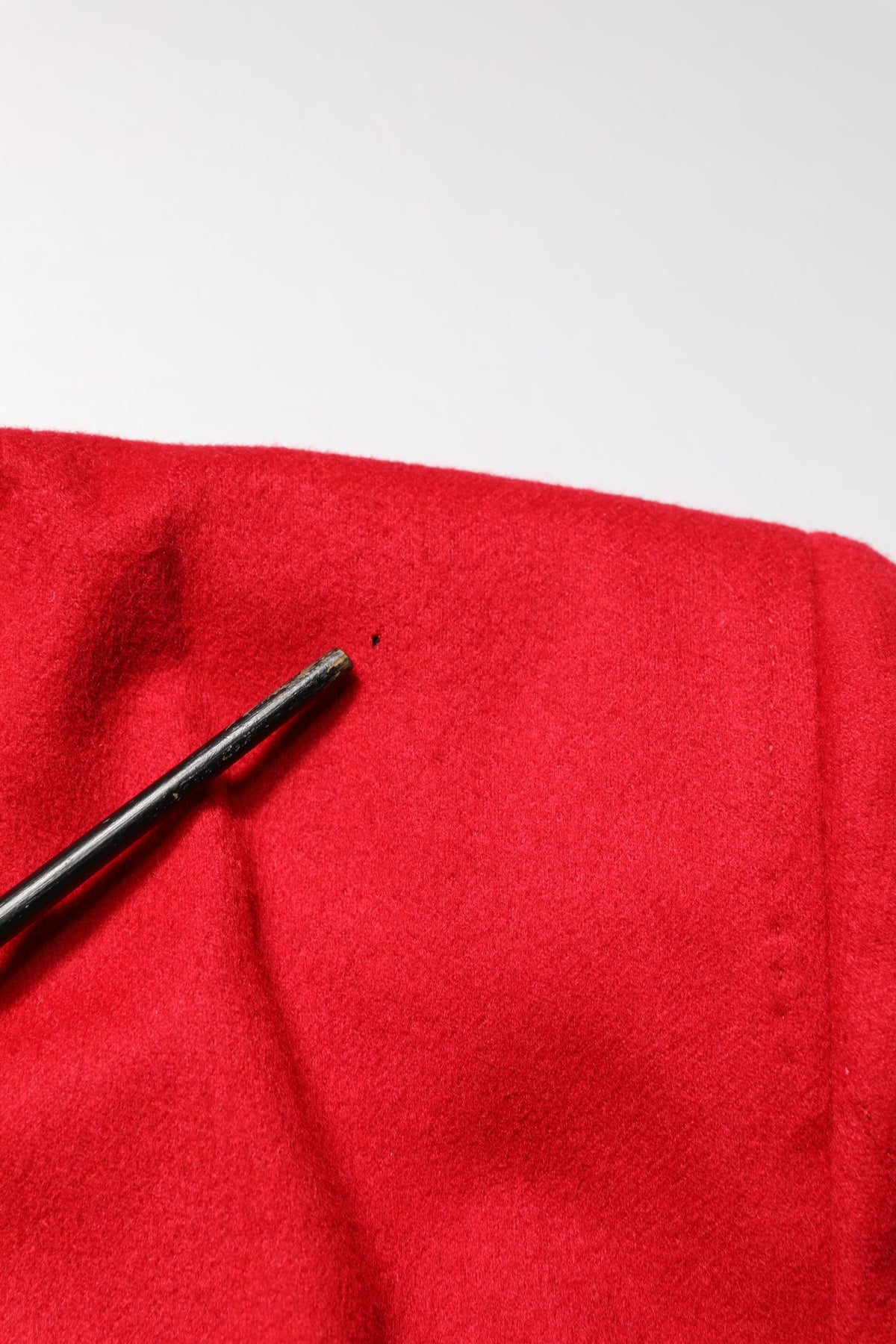 Elevate your wardrobe with the Dolce & Gabbana Red Cashmere Slim Fit Blazer, a masterpiece of Italian craftsmanship that embodies timeless elegance and sophisticated allure.