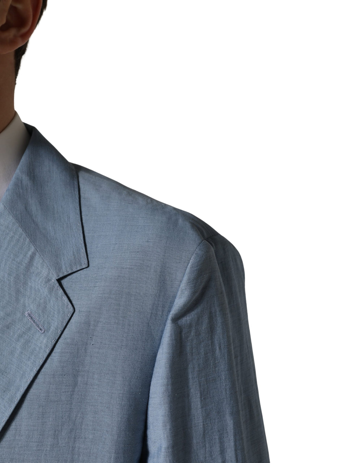 Elevate your style with the Dolce & Gabbana Light Blue Single Breasted Blazer, a masterpiece of Italian craftsmanship in luxurious linen and nylon, perfect for any sophisticated occasion.