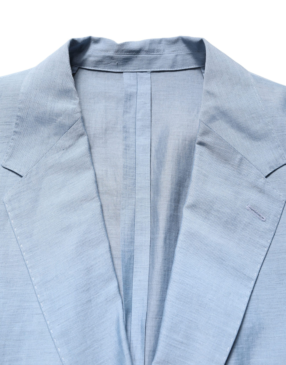 Elevate your style with the Dolce & Gabbana Light Blue Single Breasted Blazer, a masterpiece of Italian craftsmanship in luxurious linen and nylon, perfect for the discerning individual.