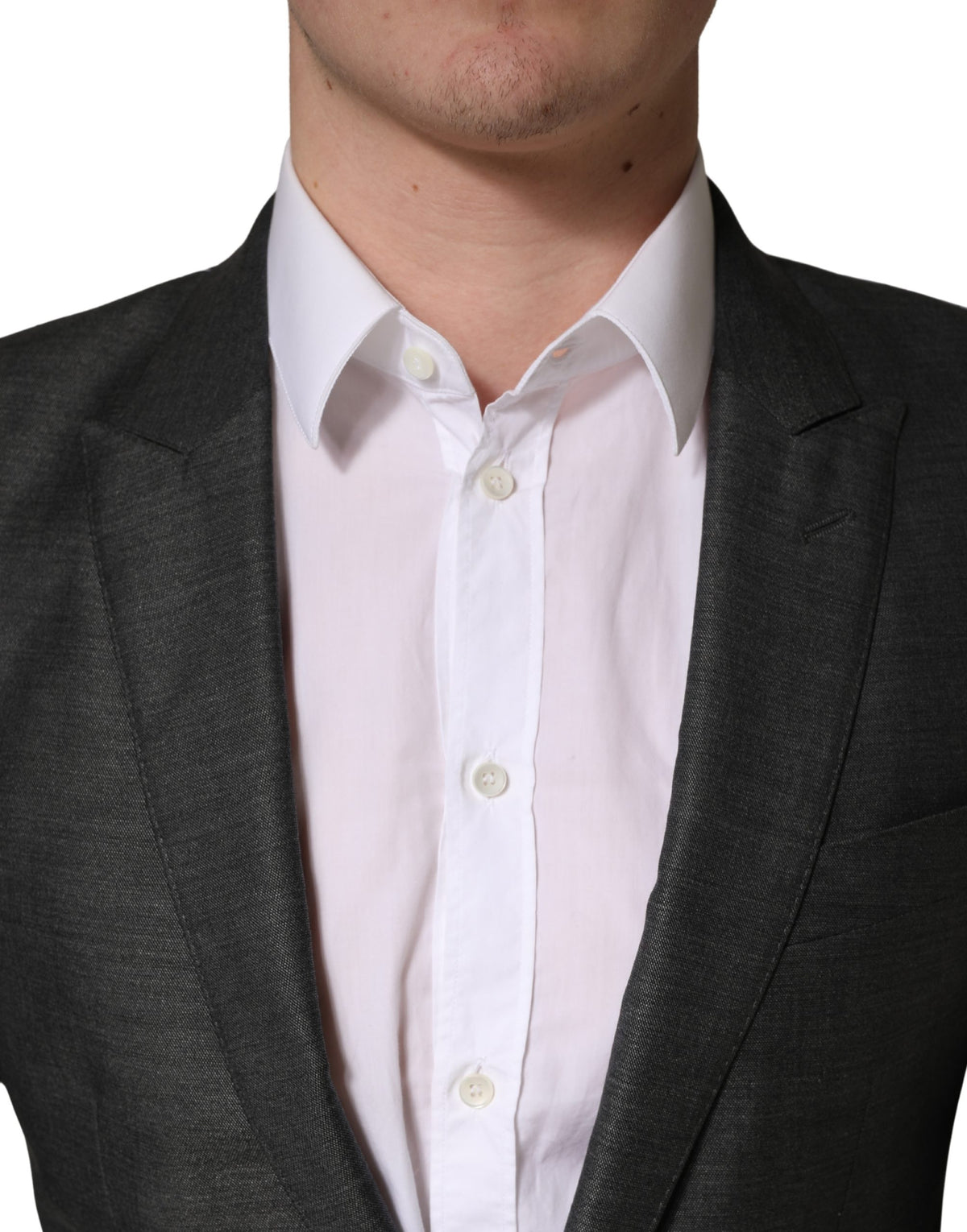 Experience the allure of the Dolce & Gabbana Dark Gray Wool Slim Fit Blazer, where exquisite Italian craftsmanship meets luxurious comfort for the discerning individual.