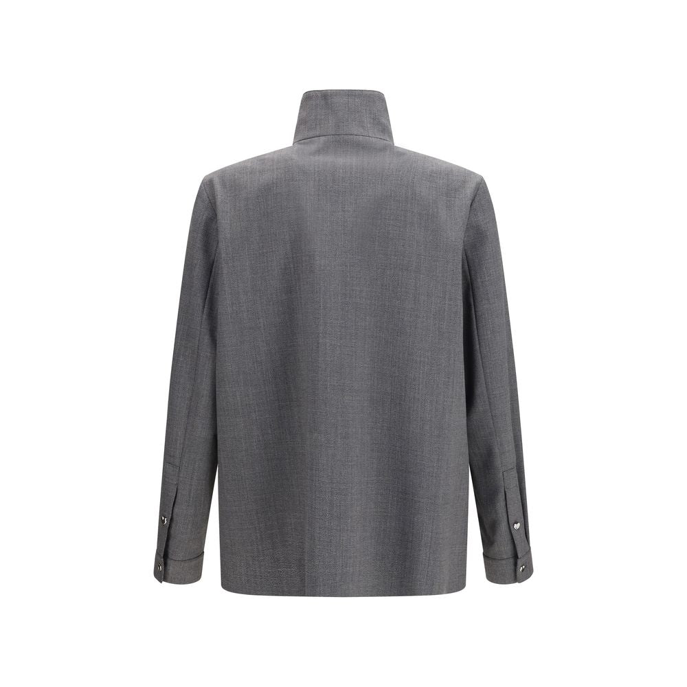 Discover the Valentino Gray Polyester Coat from the SS26 collection, a luxurious blend of wool and polyester that embodies timeless elegance and sophisticated allure.