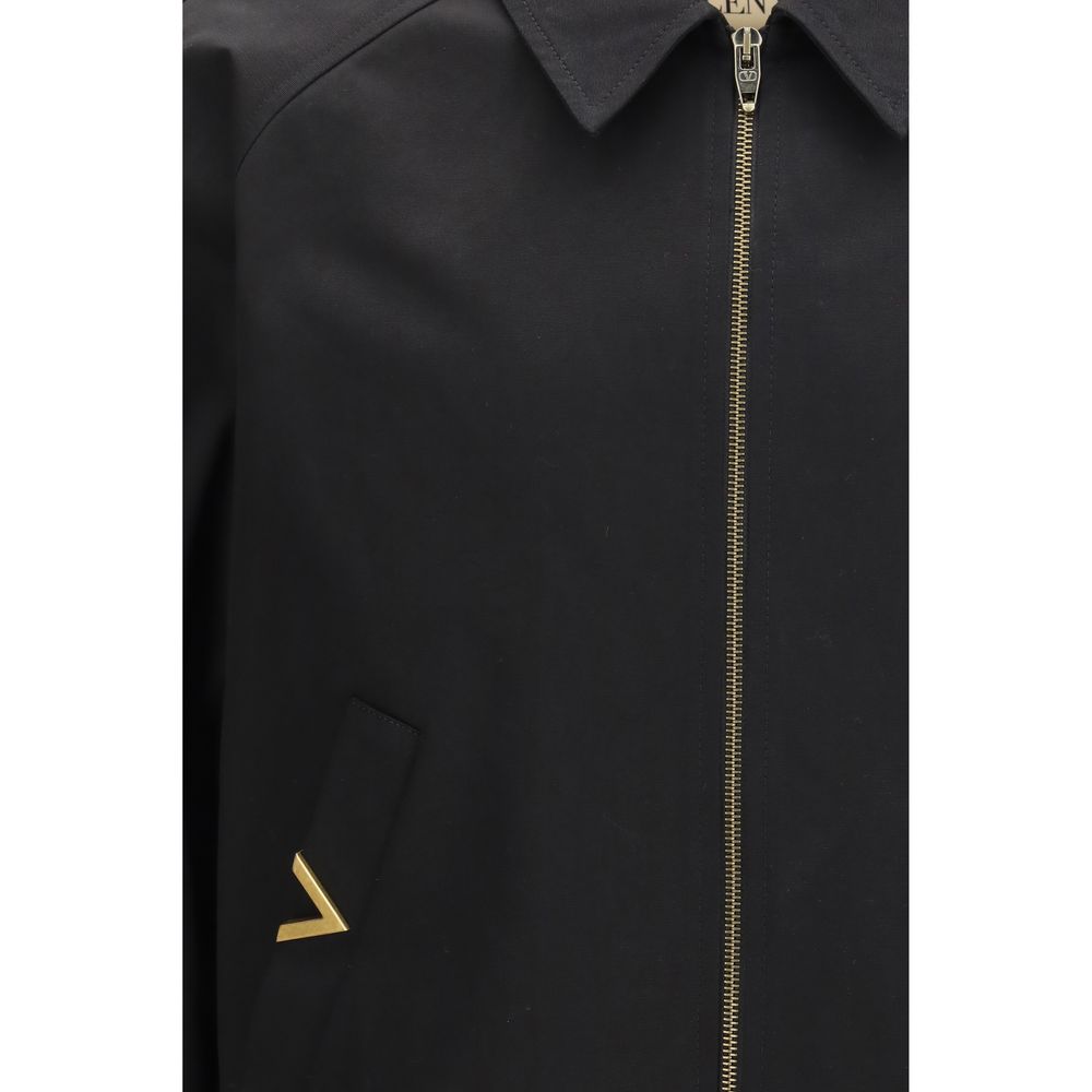 Elevate your style with the Valentino Black Cotton Bomber, a luxurious blend of comfort and sophistication, perfect for any occasion in the SS26 collection.