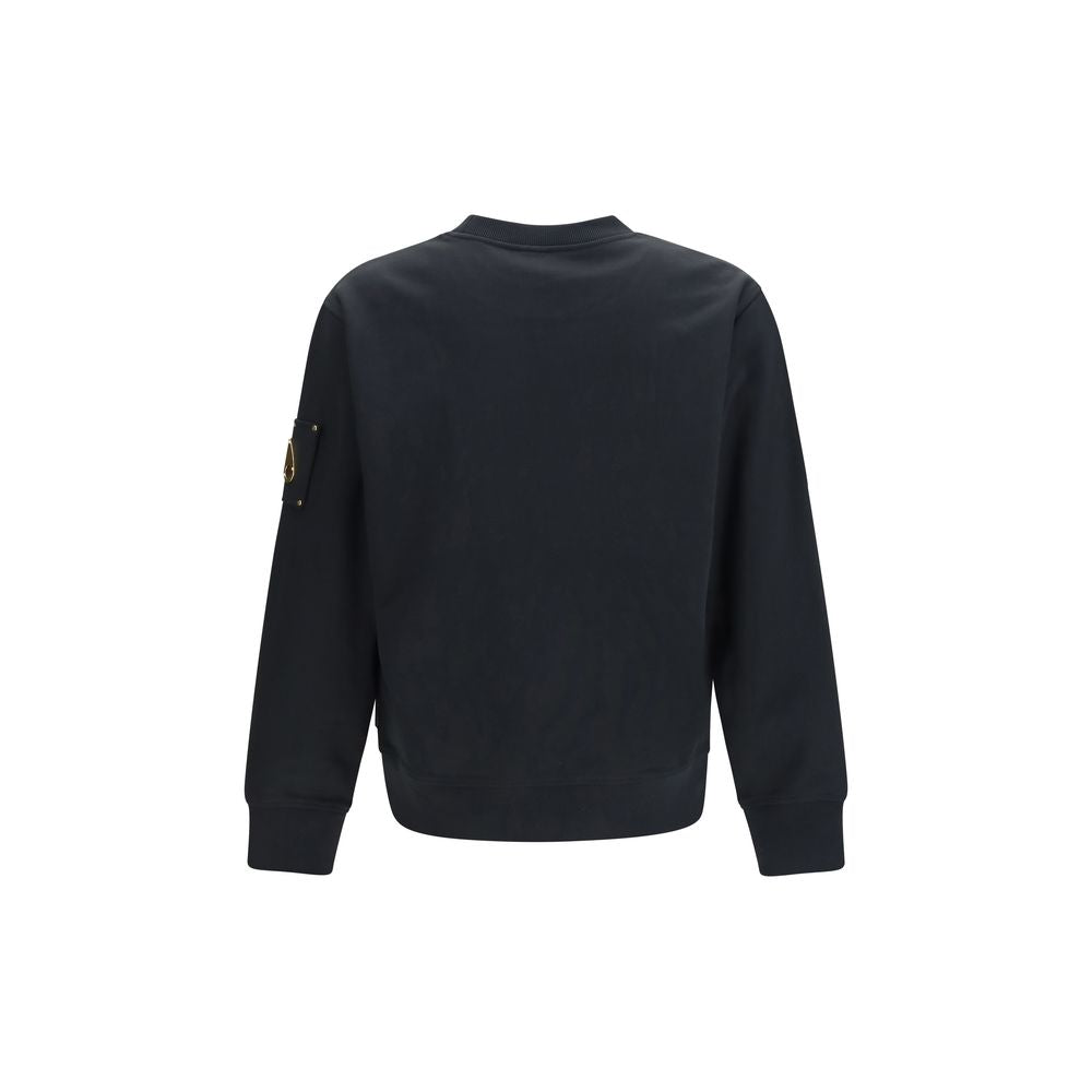 Experience the epitome of luxury with the Moose Knuckles Black Cotton Sweatshirt, crafted from soft French Terry, embodying timeless elegance and sophistication.