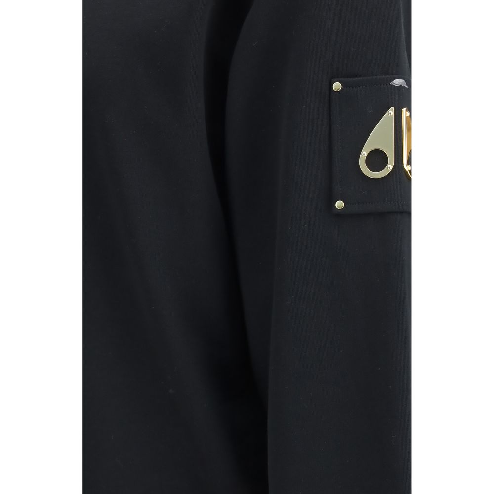 Elevate your style with the Moose Knuckles Black Cotton Sweatshirt, crafted from luxurious French Terry, embodying sophistication and timeless elegance for the discerning individual.