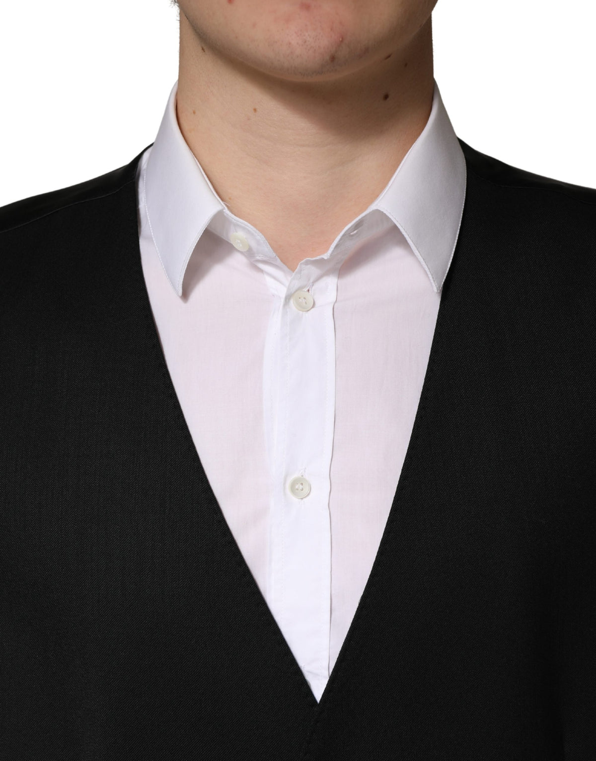 Elevate your formal attire with the Dolce & Gabbana Black Wool Single Breasted Waistcoat Vest, a masterpiece of Italian craftsmanship in luxurious virgin wool, perfect for discerning tastes.
