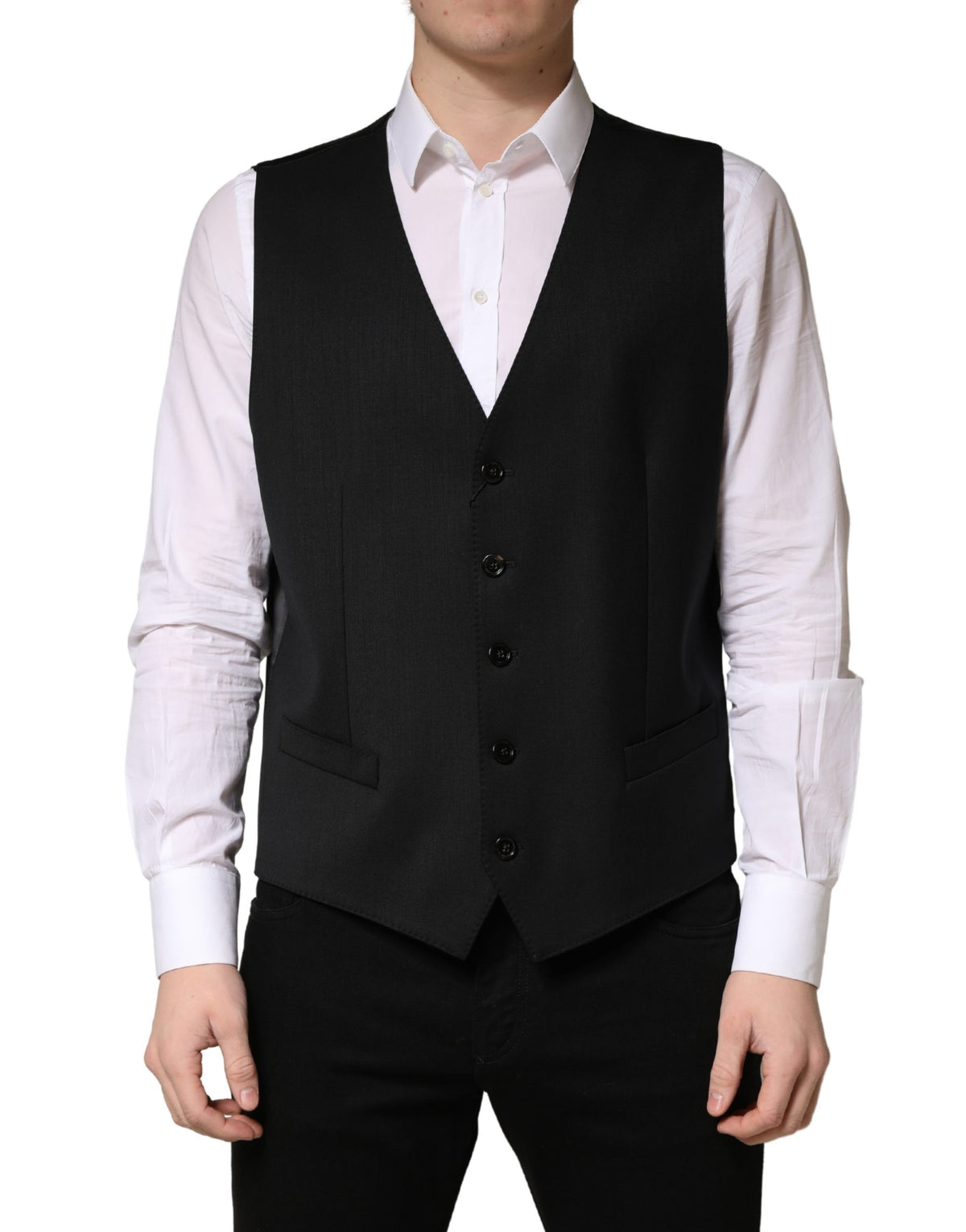 Elevate your formal wardrobe with the Dolce & Gabbana Black Wool Single Breasted Waistcoat Vest, crafted from premium virgin wool for timeless sophistication and unparalleled luxury.