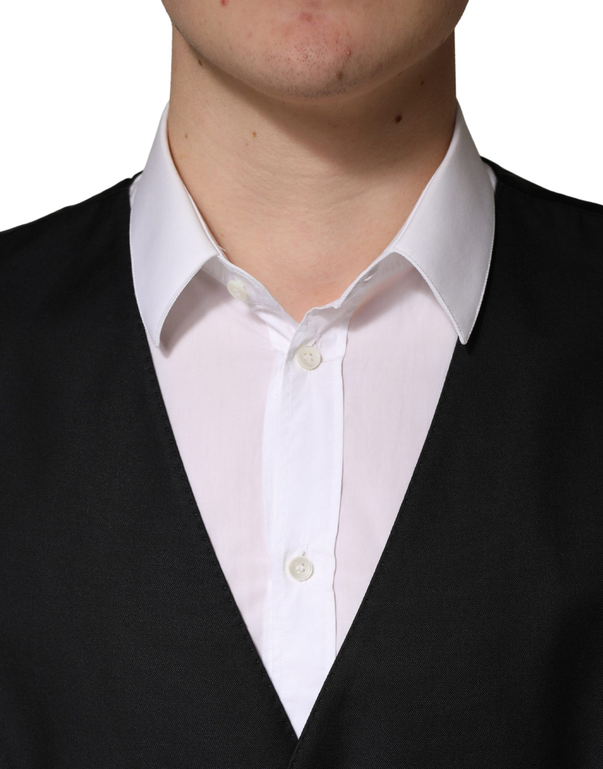 Experience the allure of the Dolce & Gabbana Black Wool Single Breasted Waistcoat Vest, crafted from premium virgin wool for a timeless elegance that elevates your style.