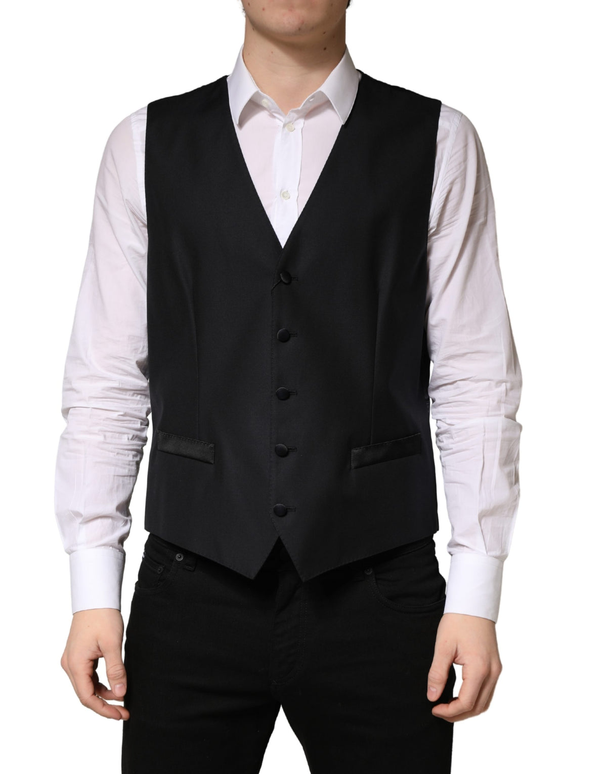 Experience the exquisite craftsmanship of the Dolce & Gabbana Black Wool Single Breasted Waistcoat Vest, a timeless piece that embodies luxury and sophistication for any discerning wardrobe.