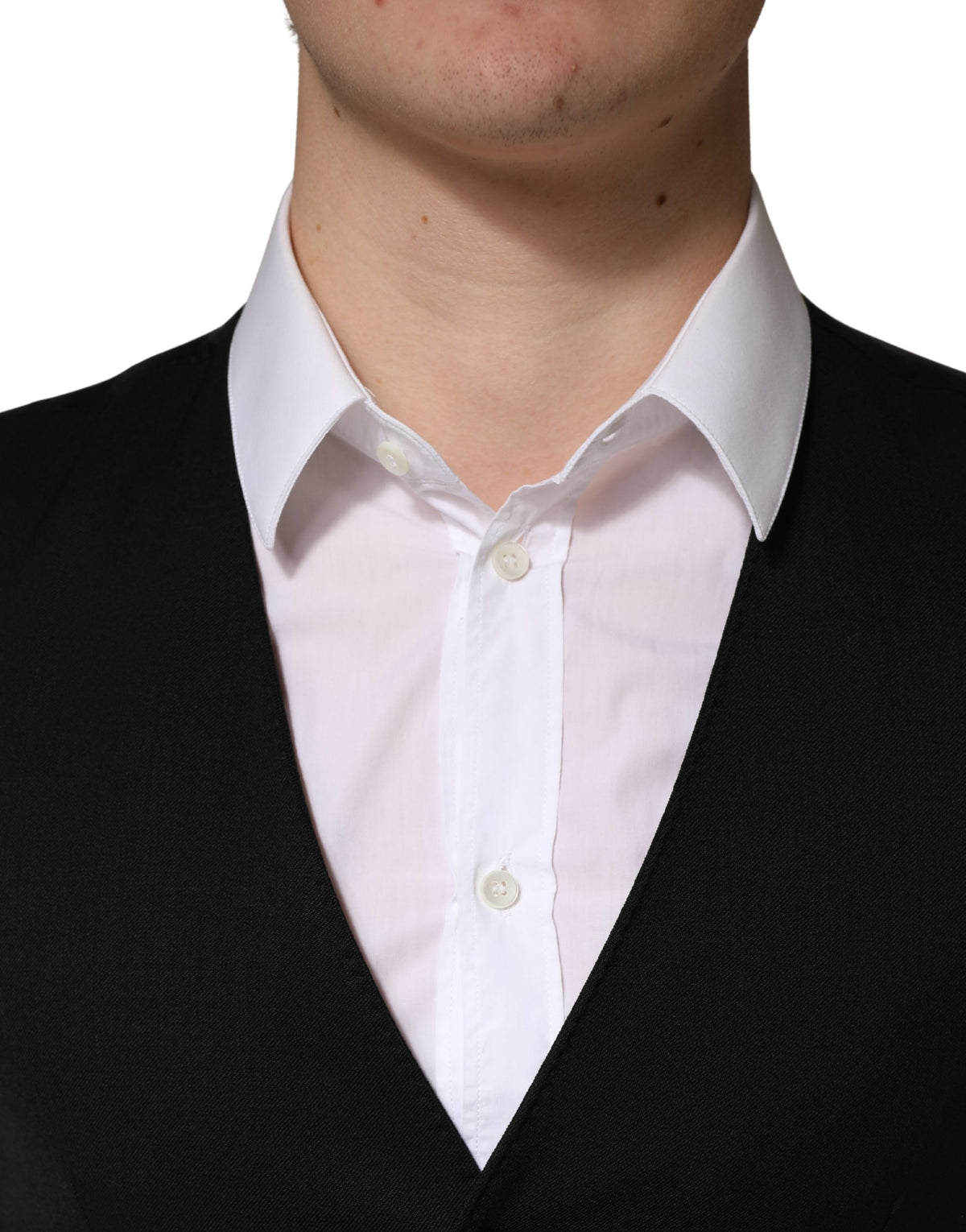 Experience the exquisite allure of the Dolce & Gabbana Black Wool Single Breasted Waistcoat Vest, a timeless masterpiece crafted in Italy, elevating every formal occasion with unparalleled elegance.