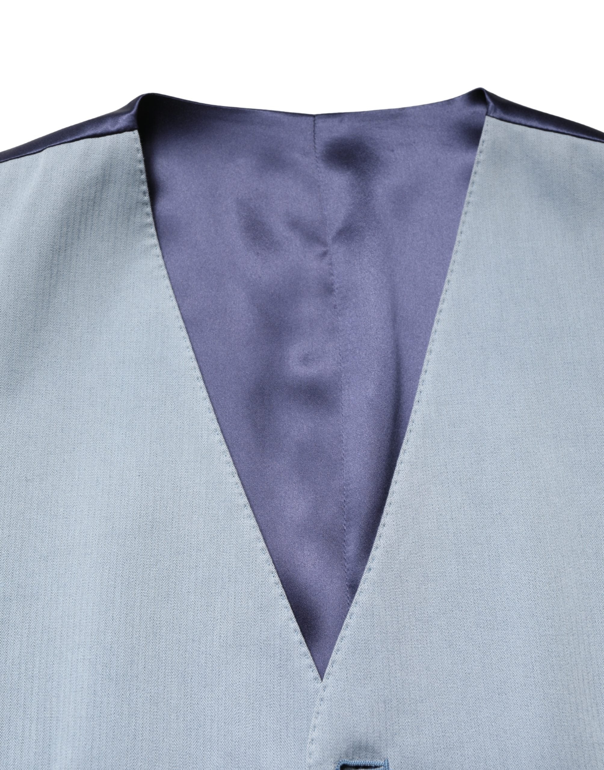 Elevate your wardrobe with the Dolce & Gabbana Gray Wool Single Breasted Waistcoat Vest, a masterpiece of Italian craftsmanship, blending luxurious wool and silk for timeless sophistication.