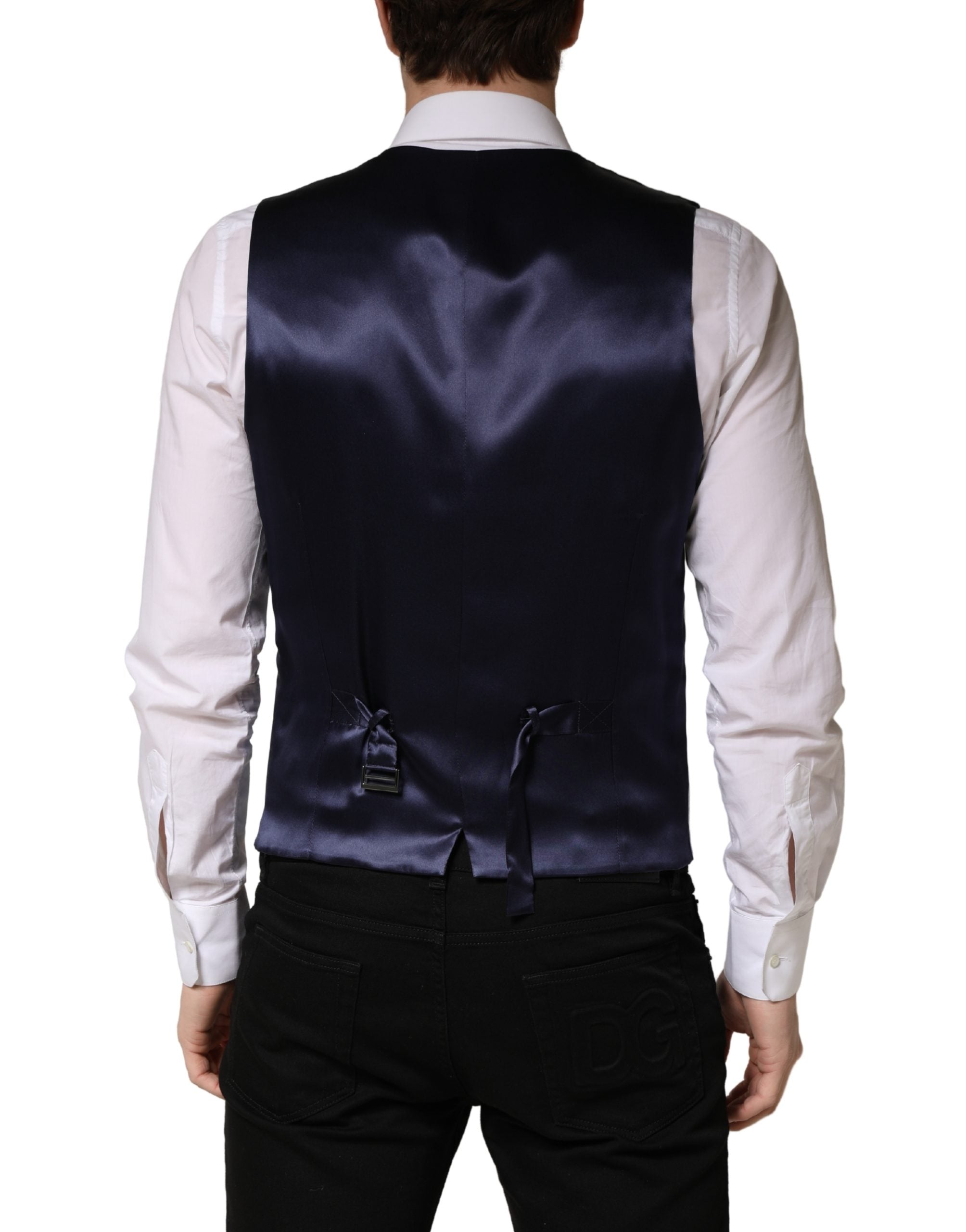 Elevate your wardrobe with the Dolce & Gabbana Gray Wool Single Breasted Waistcoat Vest, a masterpiece of Italian craftsmanship, blending luxurious materials and timeless elegance for the discerning individual.