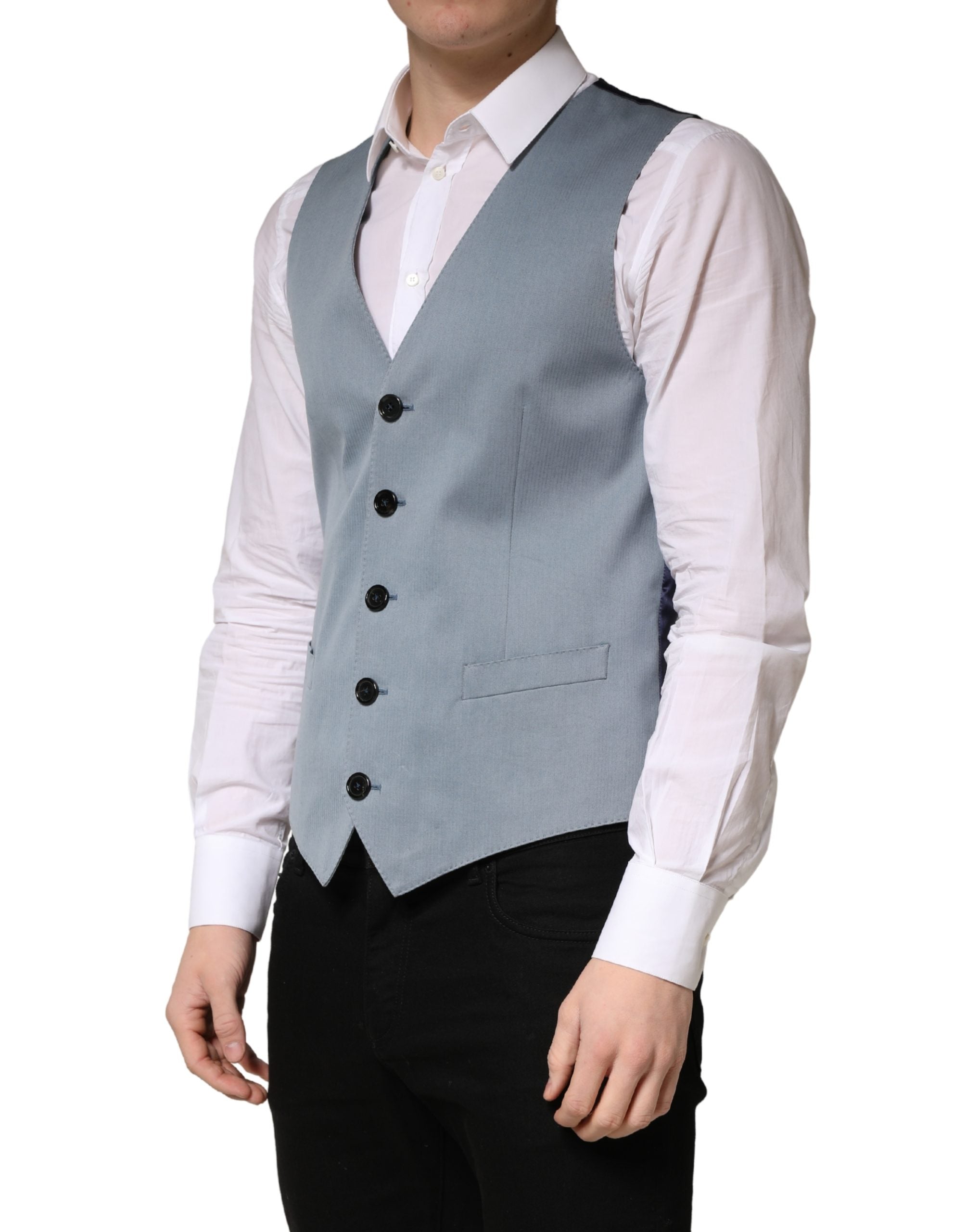 Elevate your wardrobe with the Dolce & Gabbana Gray Wool Single Breasted Waistcoat Vest, a masterpiece of Italian craftsmanship that embodies sophistication and timeless elegance.