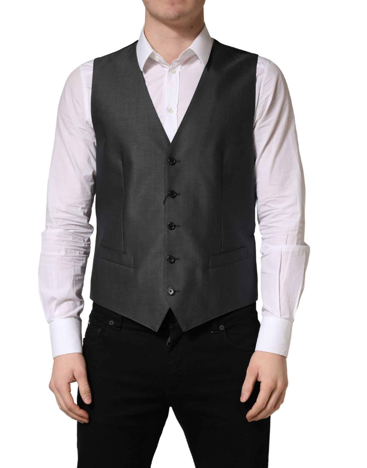 Elevate your wardrobe with the Dolce & Gabbana Dark Gray Waistcoat Vest, crafted from luxurious virgin wool and silk, embodying exquisite craftsmanship for timeless sophistication.