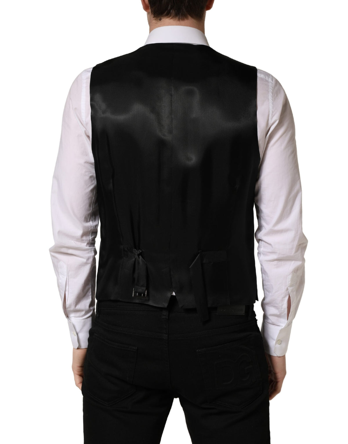 Elevate your formal wardrobe with the Dolce & Gabbana Dark Gray Waistcoat Vest, a masterpiece of 82% virgin wool and 18% silk, embodying exquisite craftsmanship and timeless elegance.