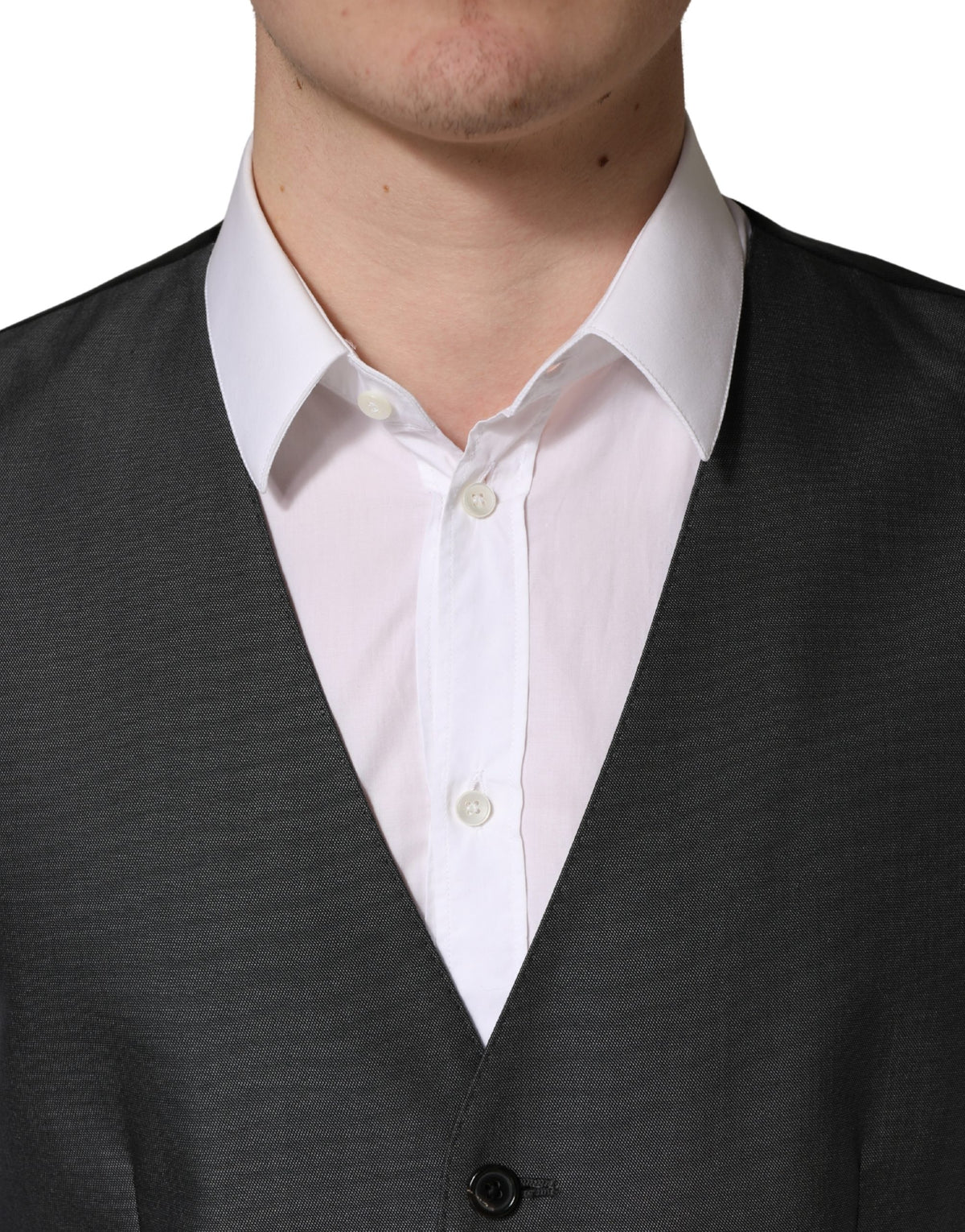 Elevate your formal attire with the Dolce & Gabbana Dark Gray Waistcoat Vest, a luxurious blend of virgin wool and silk, embodying exquisite craftsmanship and timeless elegance.