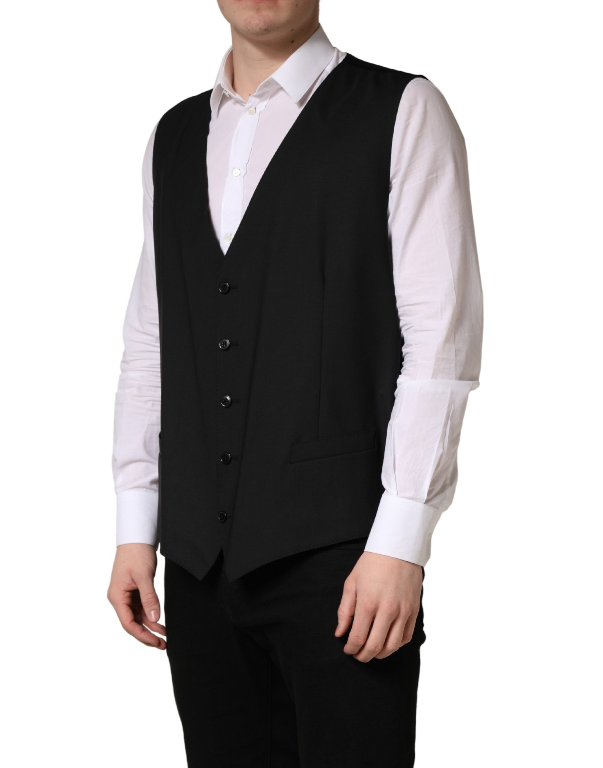 Elevate your elegance with the Dolce & Gabbana Black Wool Single Breasted Waistcoat Vest, a masterpiece of Italian craftsmanship, designed for the discerning connoisseur.