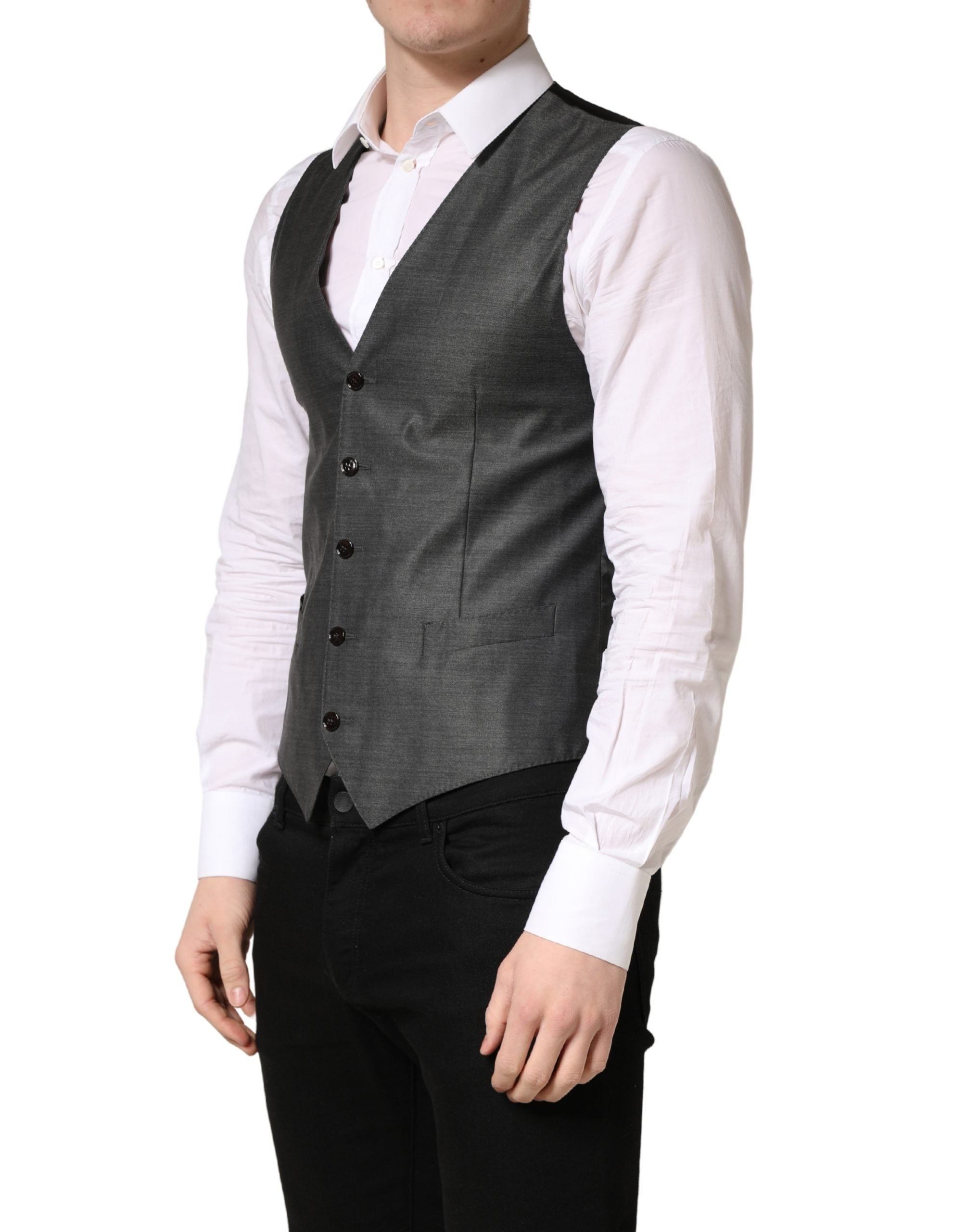 Indulge in the exquisite Dolce & Gabbana Dark Gray Wool Dress Formal Waistcoat Vest, a masterpiece of luxurious virgin wool and silk, embodying timeless elegance and sophistication.