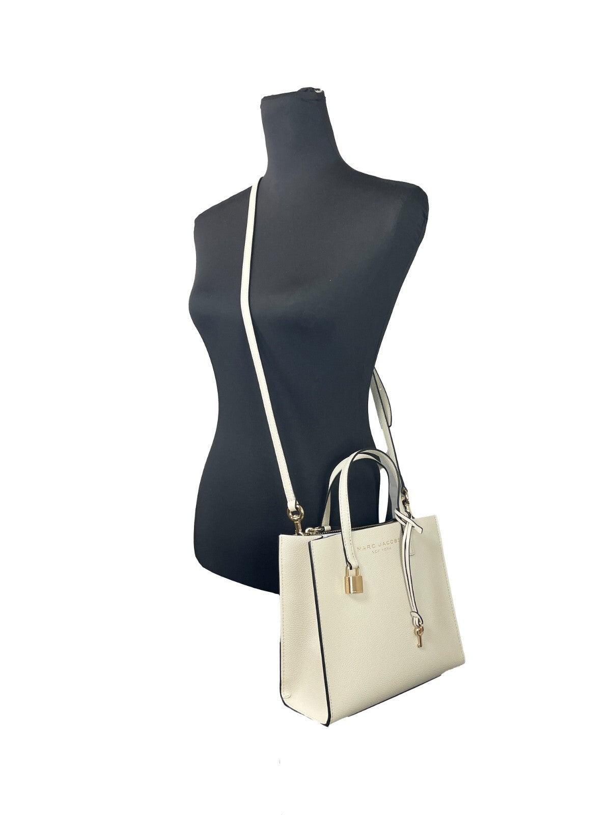 Discover the Marc Jacobs Women's Mini Pebbled Tote from the 2023 Grind collection, a luxurious blend of exquisite craftsmanship and timeless elegance, perfect for any occasion.