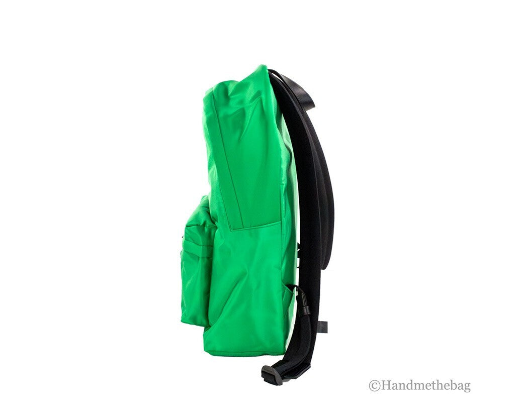Elevate your style with the Versace Large Bright Green Nylon Fabric Medusa Shoulder Backpack, a stunning blend of luxury and functionality for the discerning individual.