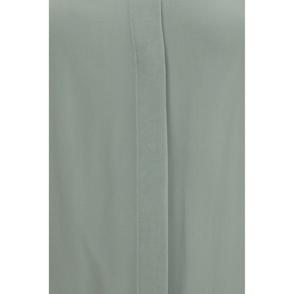 Elevate your wardrobe with the Max Mara Bicolor Silk Shirt, a masterpiece of sheer silk that embodies sophistication and timeless elegance for any occasion.
