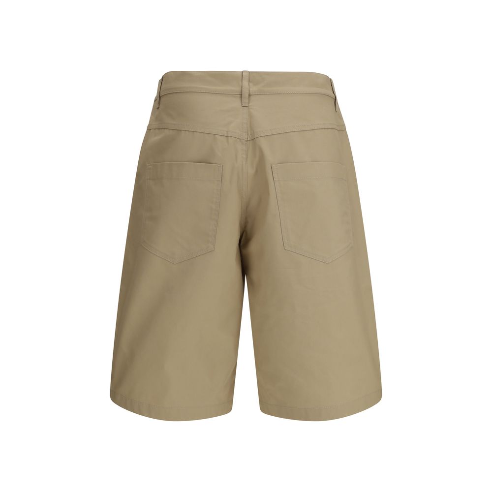 Elevate your summer wardrobe with Moschino Beige Cotton Bermuda Shorts, where luxurious comfort meets effortless style, perfect for the discerning individual.