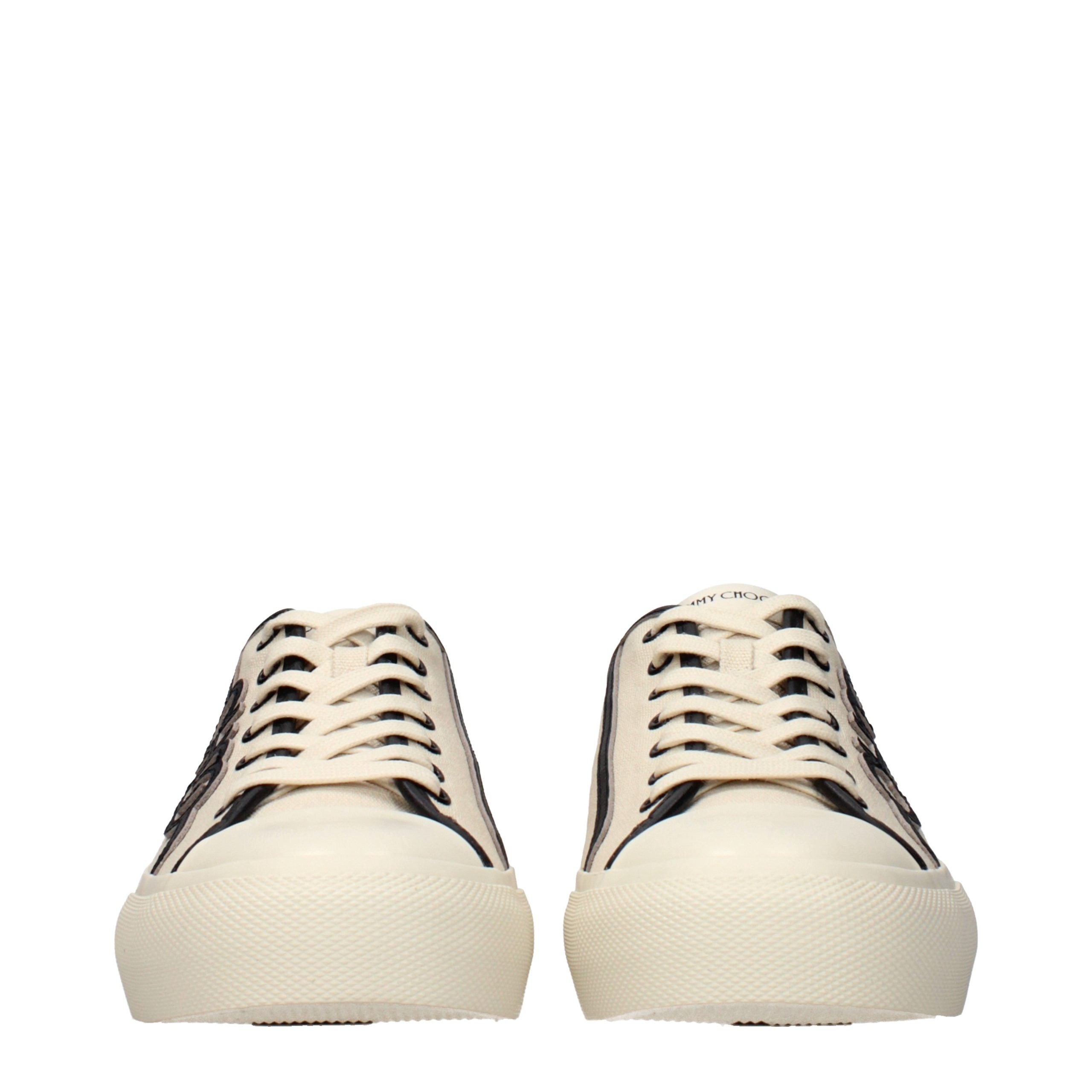 Indulge in the exquisite Jimmy Choo Beige Fabric Low Top Sneakers, where luxurious craftsmanship meets timeless elegance, perfect for the discerning individual seeking effortless sophistication.