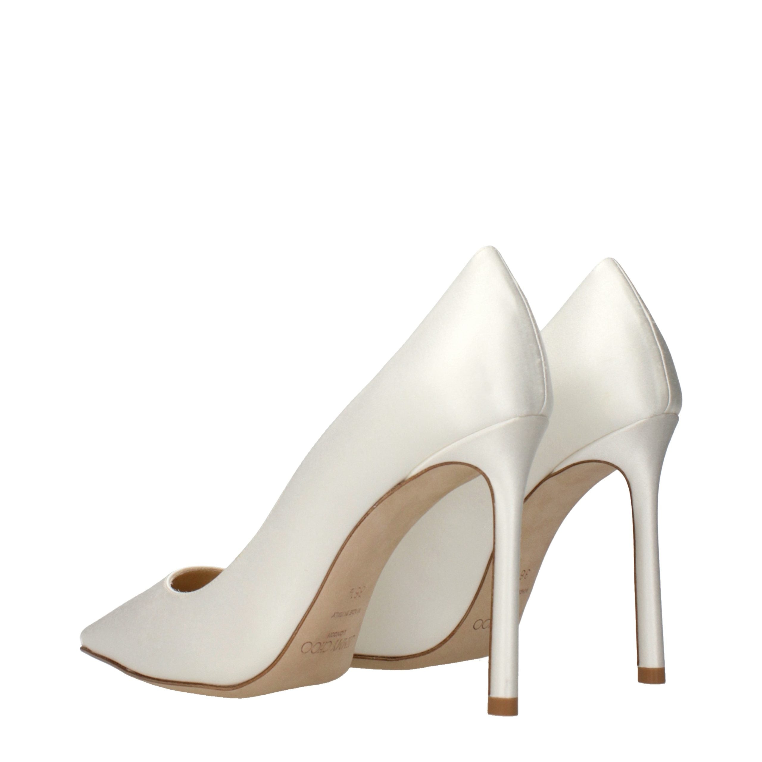 Elevate your elegance with Jimmy Choo Beige Satin Platform Pumps, where exquisite craftsmanship meets timeless sophistication, perfect for any luxurious occasion.