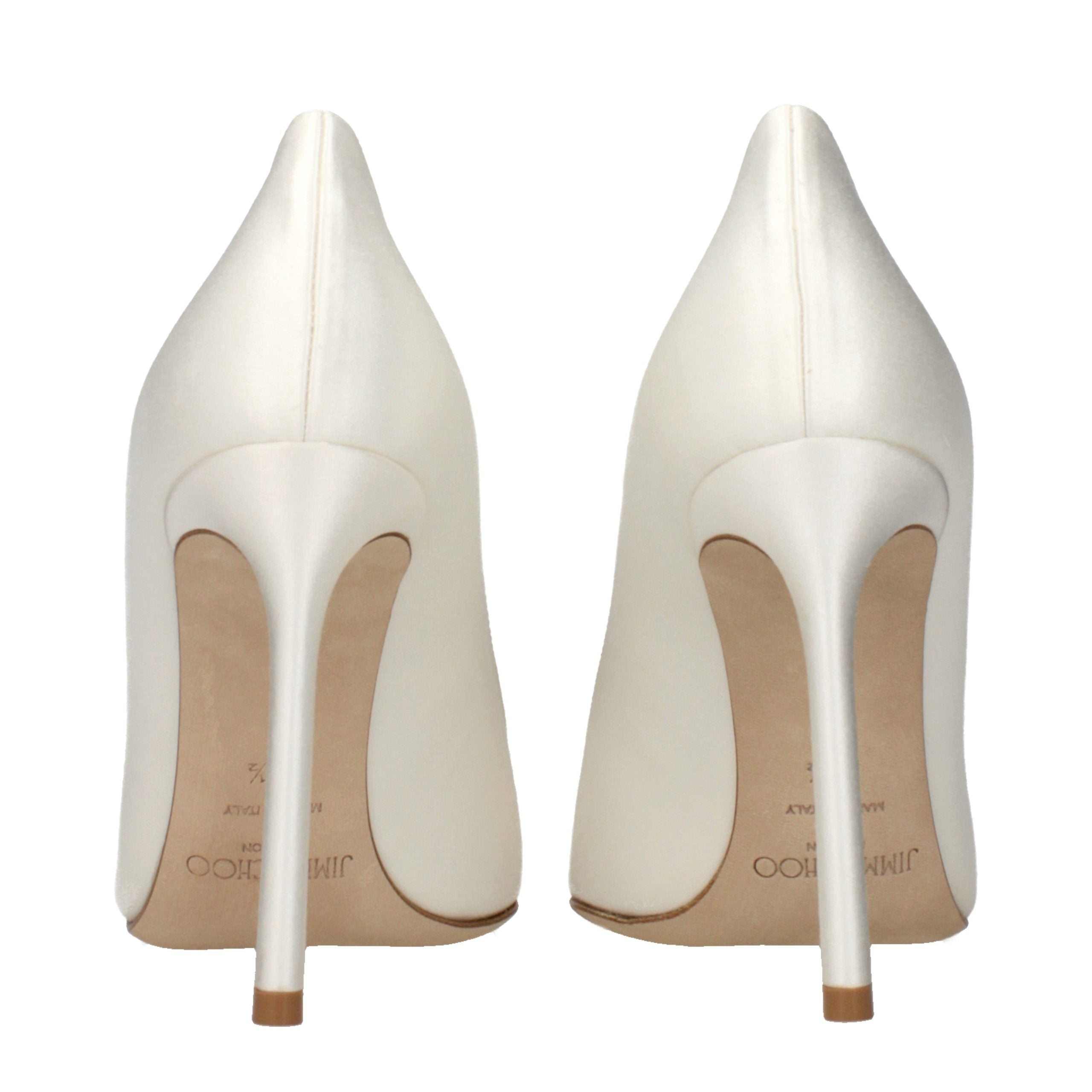 Elevate your elegance with Jimmy Choo Beige Satin Platform Pumps, a masterpiece of exquisite craftsmanship that embodies luxury and sophistication for every occasion.