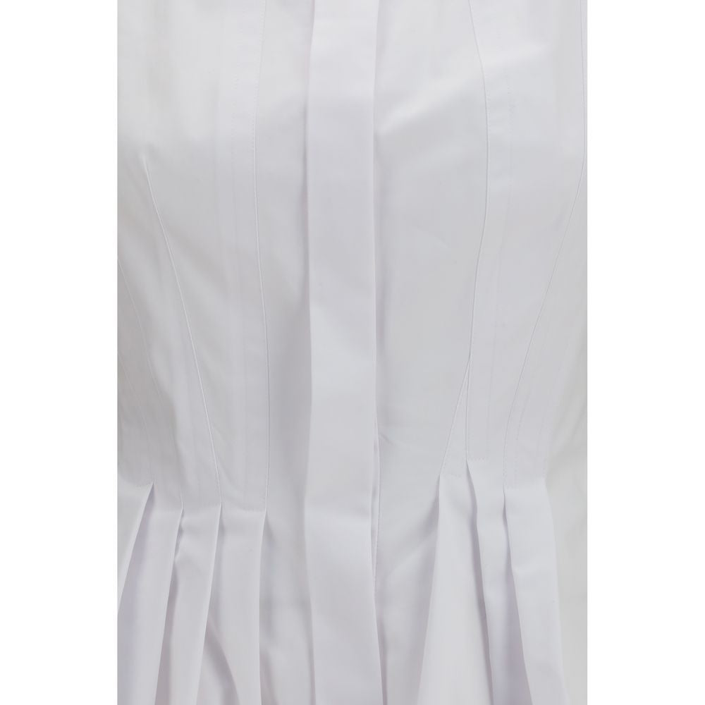 Experience the exquisite allure of the Max Mara White Cotton Shirt, a timeless piece from the SS26 collection, crafted for effortless elegance and sophistication.