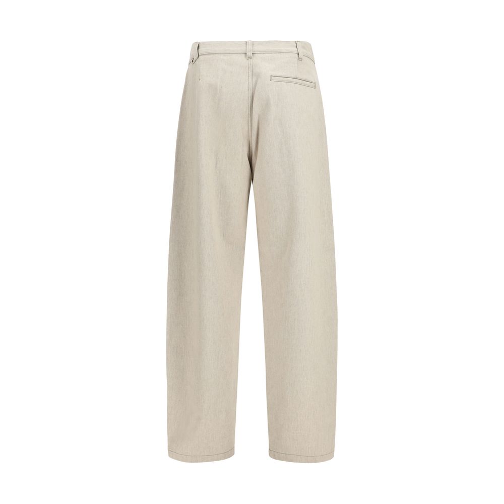 Elevate your wardrobe with Jacquemus Beige Cotton Casual Pants, a luxurious blend of raw cotton and hemp, embodying contemporary elegance and effortless sophistication.