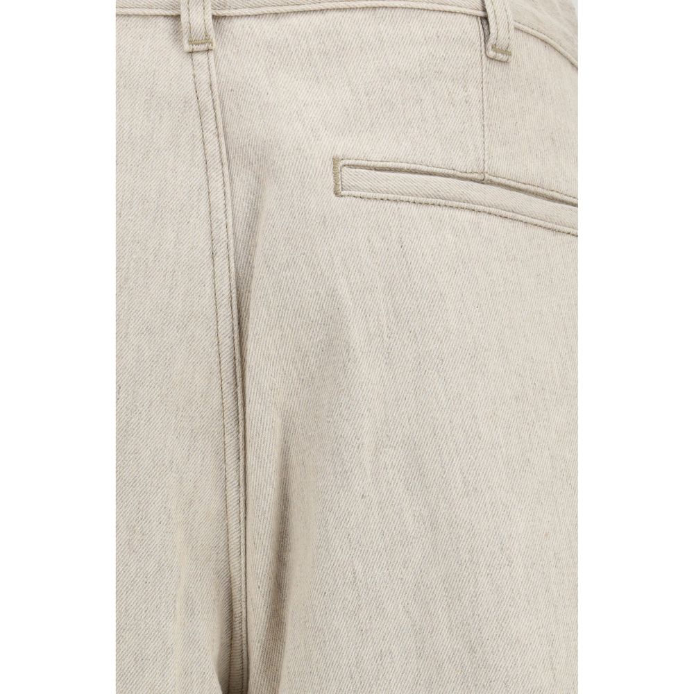 Elevate your wardrobe with Jacquemus Beige Cotton Casual Pants, a luxurious blend of raw cotton and hemp, embodying contemporary elegance and refined sophistication.