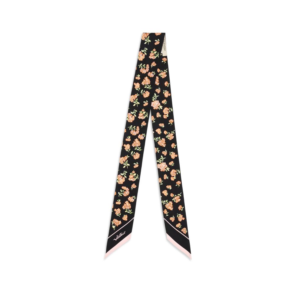 Indulge in the exquisite Valentino Garavani Multicolor Silk Scarf, a masterpiece of 100% silk that elevates your style with iconic elegance and timeless allure.