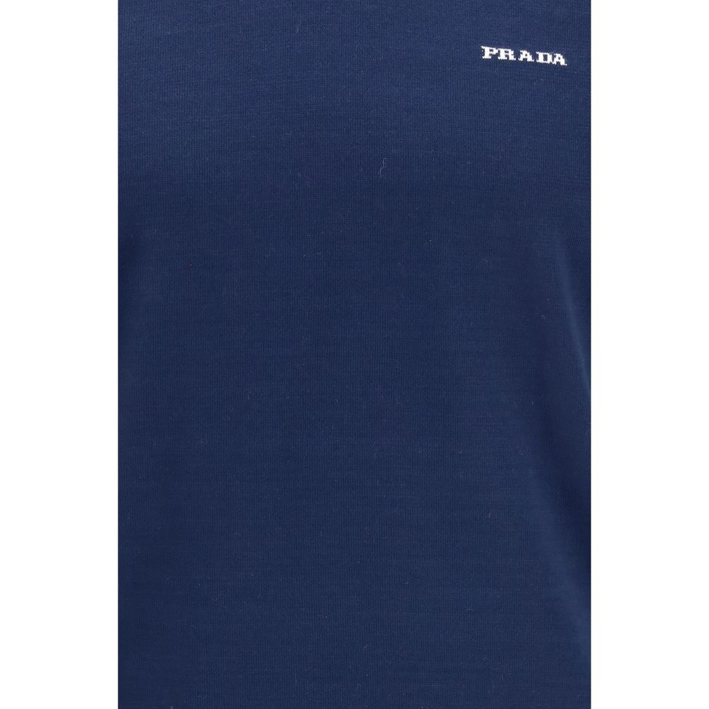 Experience the allure of the Prada Blue Cotton T-Shirt, crafted from luxurious cotton for effortless elegance, embodying timeless sophistication in every detail.