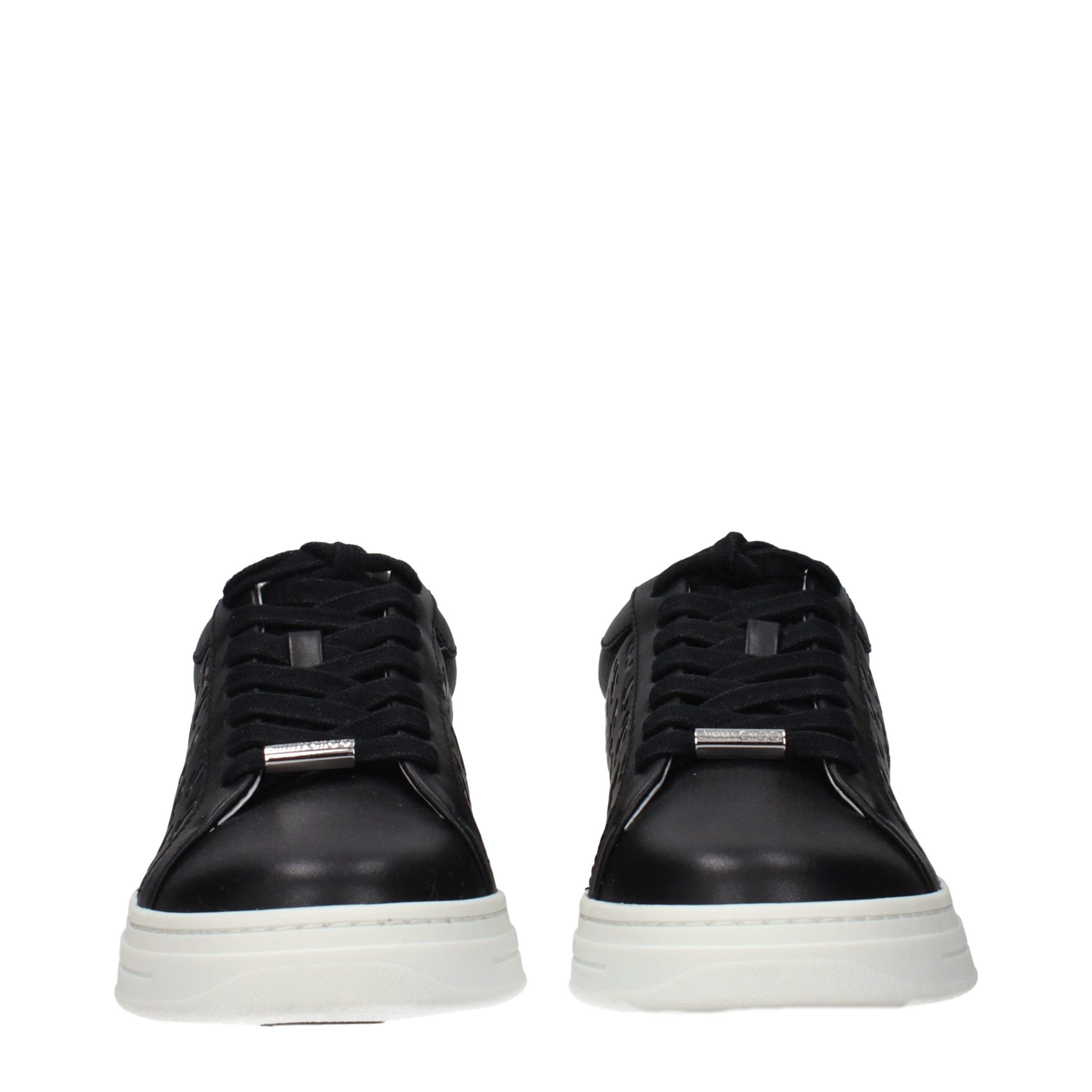 Experience the exquisite craftsmanship of Jimmy Choo Black Leather Low Top Sneakers, where timeless elegance meets modern sophistication for the discerning connoisseur.