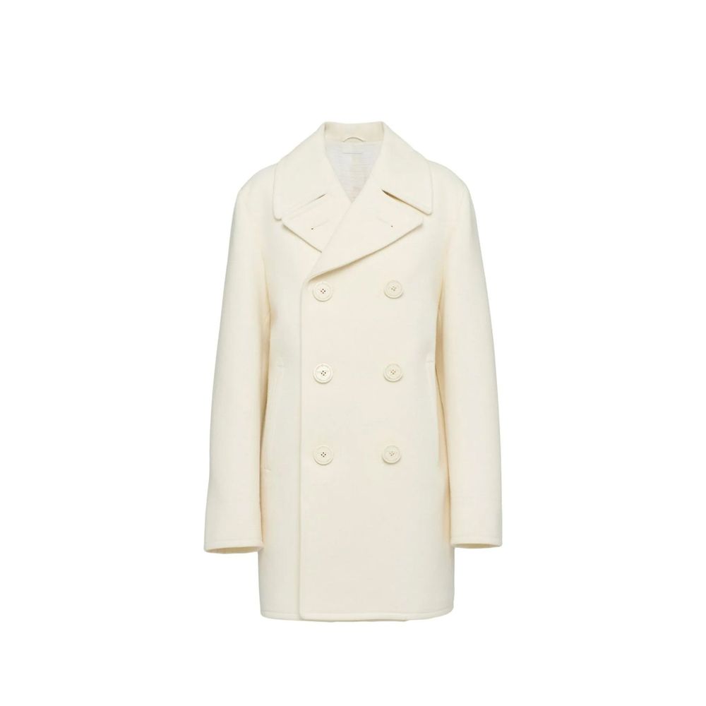Elevate your wardrobe with the Prada White Wool Coat, a timeless masterpiece of Italian craftsmanship, exuding elegance and sophistication for the discerning individual.