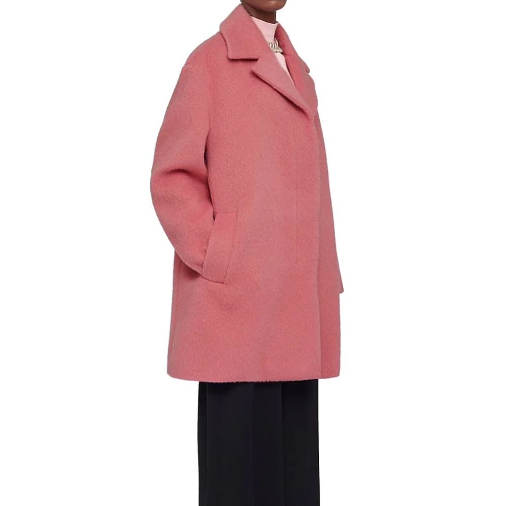 Discover the Jil Sander Multicolor Mohair Coat, a luxurious blend of mohair and wool, embodying timeless elegance and exquisite craftsmanship for the discerning individual.