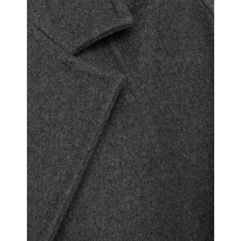 Indulge in the opulence of the Max Mara Gray Cashmere Coat, crafted from a sumptuous blend of cashmere and wool, embodying timeless elegance and effortless sophistication.