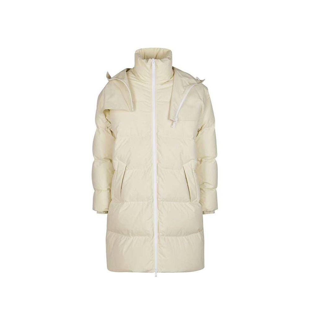 Experience the exquisite Bottega Veneta Beige Cotton Coat, a luxurious blend of comfort and elegance, crafted in Italy for the discerning individual who embodies sophistication.