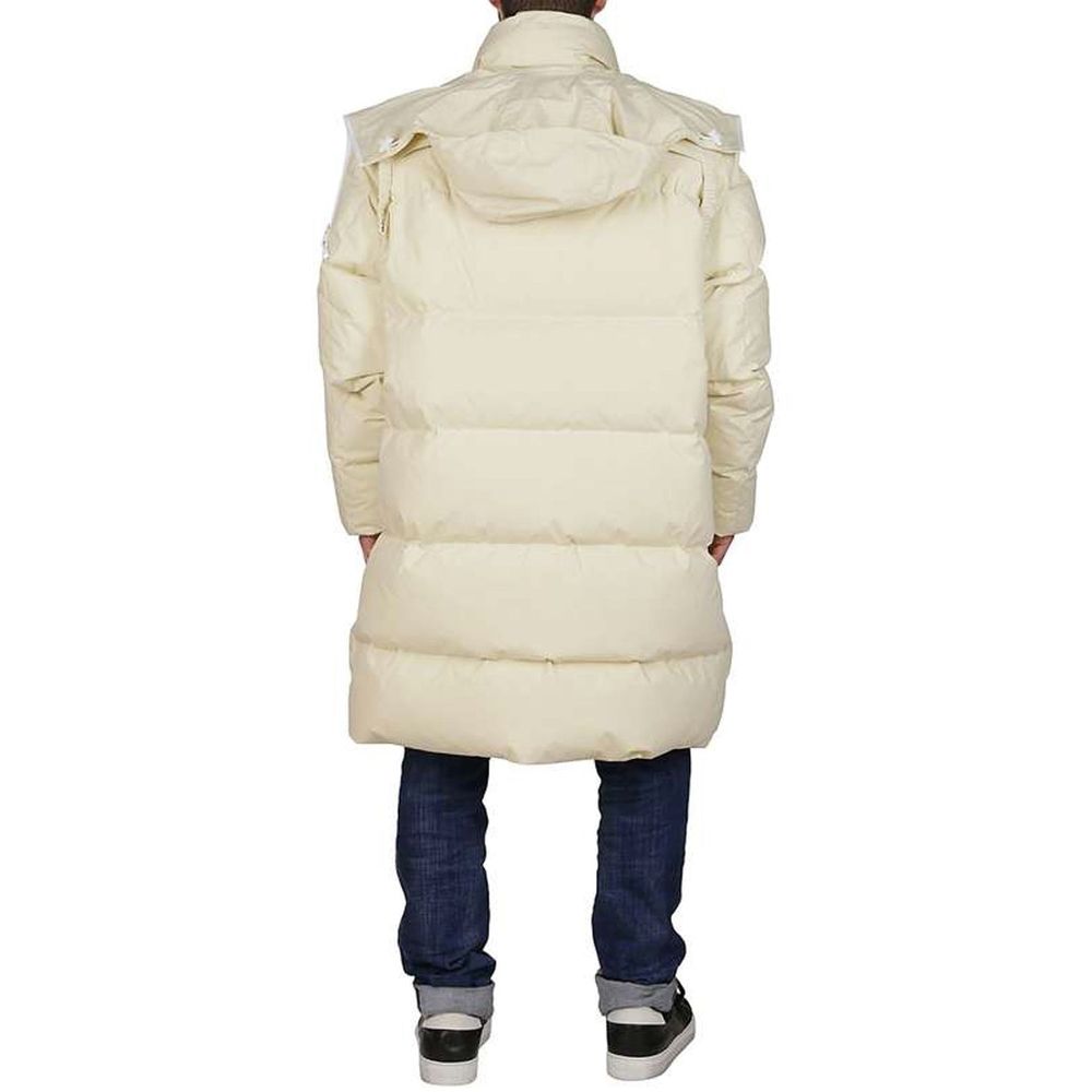 Experience the exquisite Bottega Veneta Beige Cotton Coat, a luxurious blend of Italian craftsmanship and timeless elegance, perfect for the discerning fashionista.