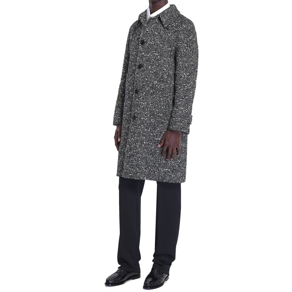 Discover the Celine Gray Mohair Coat, a luxurious blend of mohair and wool, embodying refined sophistication and timeless elegance for the discerning individual.