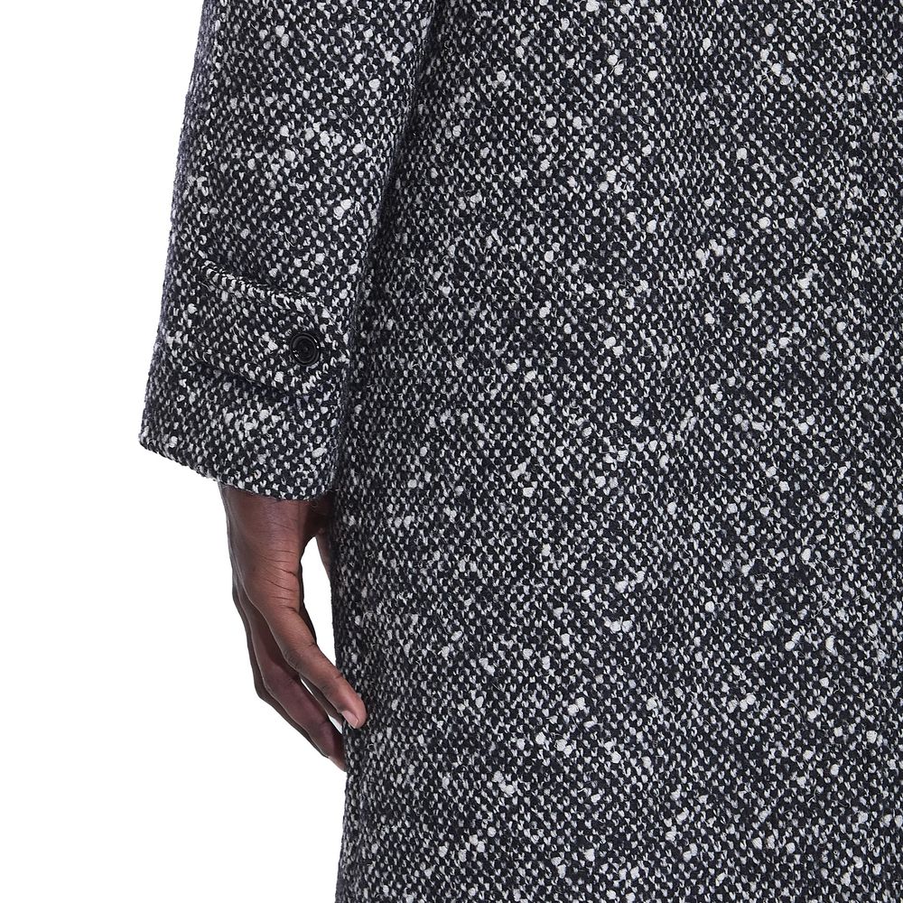 Indulge in the Celine Gray Mohair Coat, a masterpiece of Italian craftsmanship blending mohair, polyamide, and wool for unparalleled elegance and warmth.