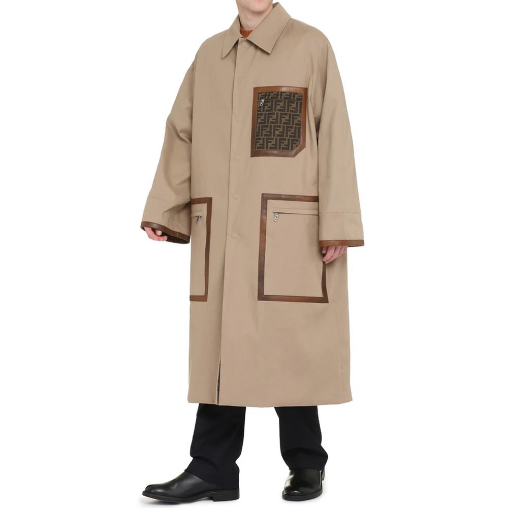 Elevate your style with the Fendi Beige Cotton Coat, a masterpiece of Italian craftsmanship in luxurious cotton, designed for the discerning individual who values elegance and sophistication.