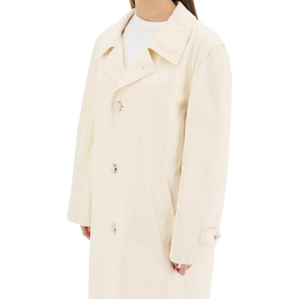 Elevate your wardrobe with the Maison Margiela White Cotton Coat, a masterpiece of Italian craftsmanship, embodying timeless elegance and sophistication for every occasion.
