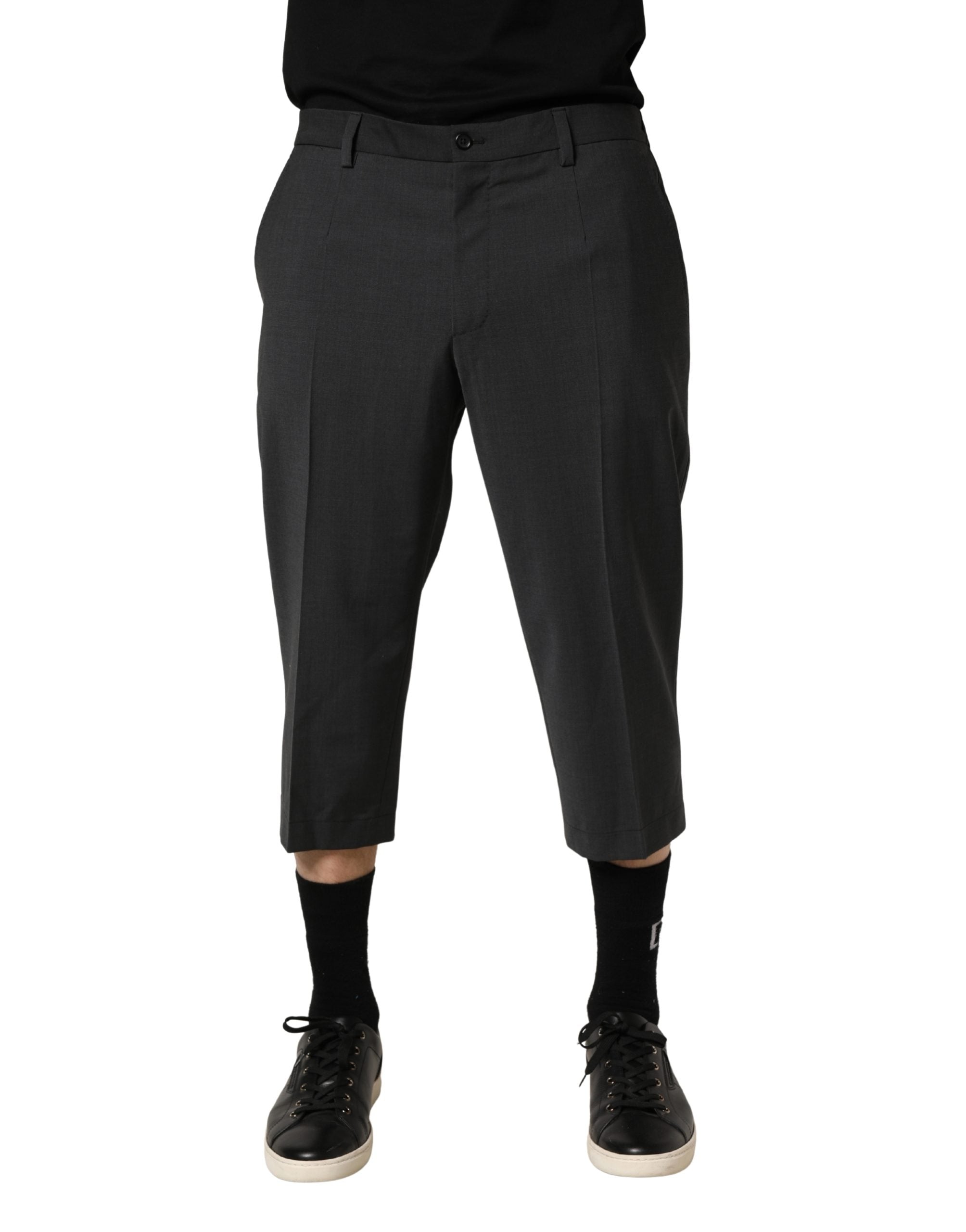 Elevate your wardrobe with Dolce & Gabbana's Dark Gray Wool Cropped Chino Trouser Pants, a masterpiece of Italian craftsmanship that exudes timeless elegance and versatility.