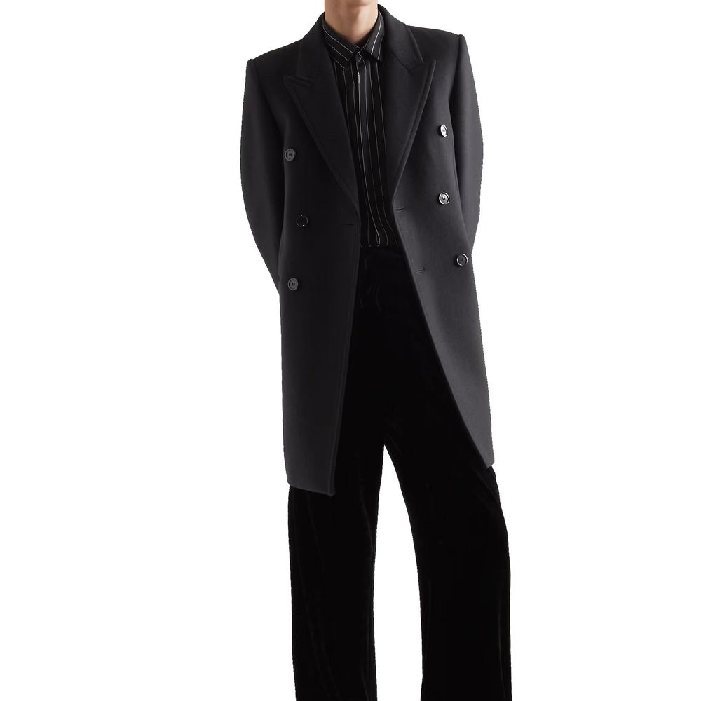 Discover the Saint Laurent Black Wool Coat, a masterpiece of Italian craftsmanship, blending timeless elegance with modern sophistication for the discerning individual.