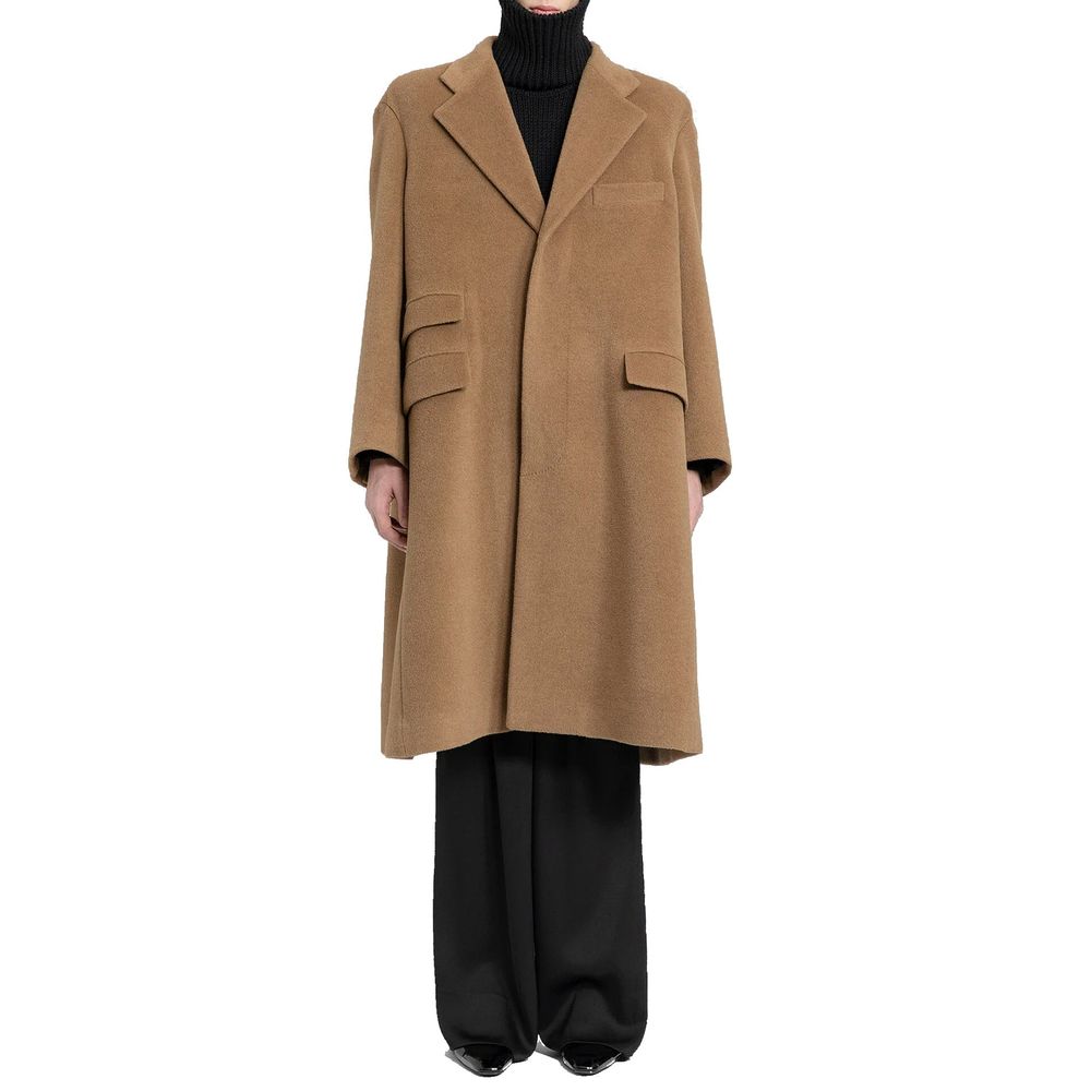 Elevate your wardrobe with the Saint Laurent Brown Wool Coat, a masterpiece of Italian craftsmanship in luxurious wool, embodying timeless elegance and sophistication.