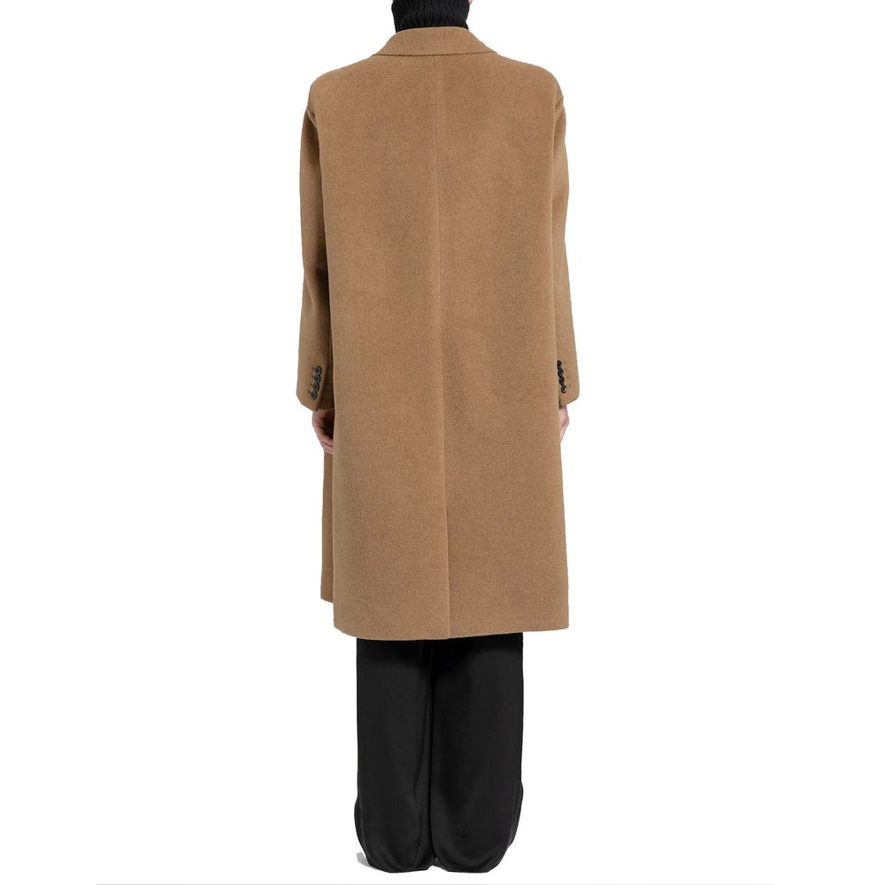 Experience the epitome of elegance with the Saint Laurent Brown Wool Coat, crafted from 100% premium wool, merging timeless luxury with modern sophistication.
