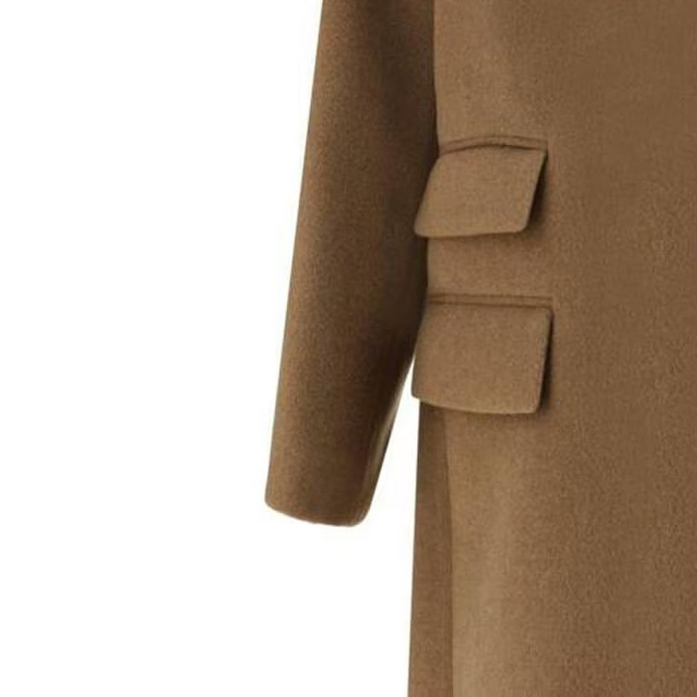 Discover the Saint Laurent Brown Wool Coat, a masterpiece of Italian craftsmanship in 100% premium wool, embodying timeless elegance and sophisticated allure for the discerning individual.